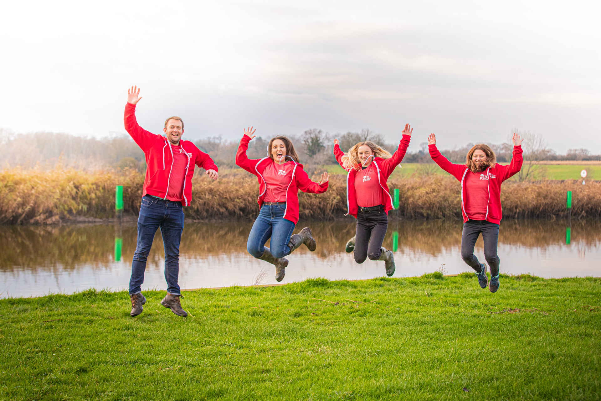 Dog walking group jumping