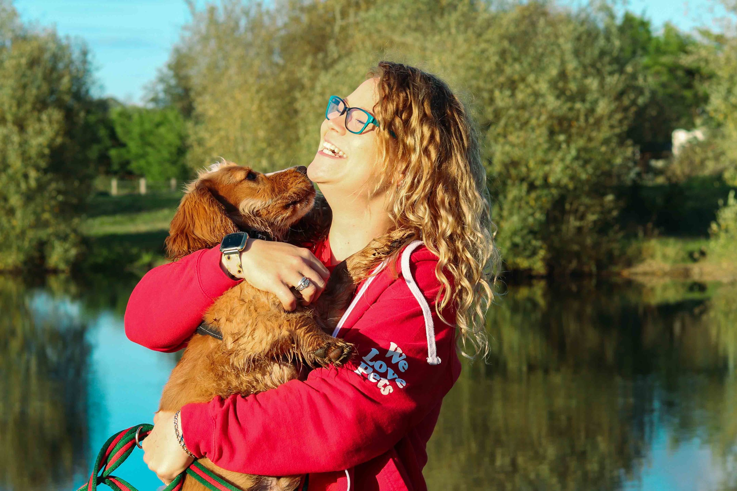 Leanne from We Love Pets Waveney holding a dog